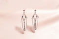 Ring & Feather Draped Chain Earrings