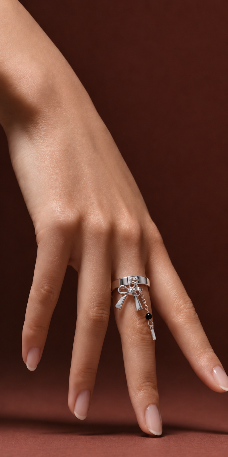Silver Bow Tassel Drop Ring