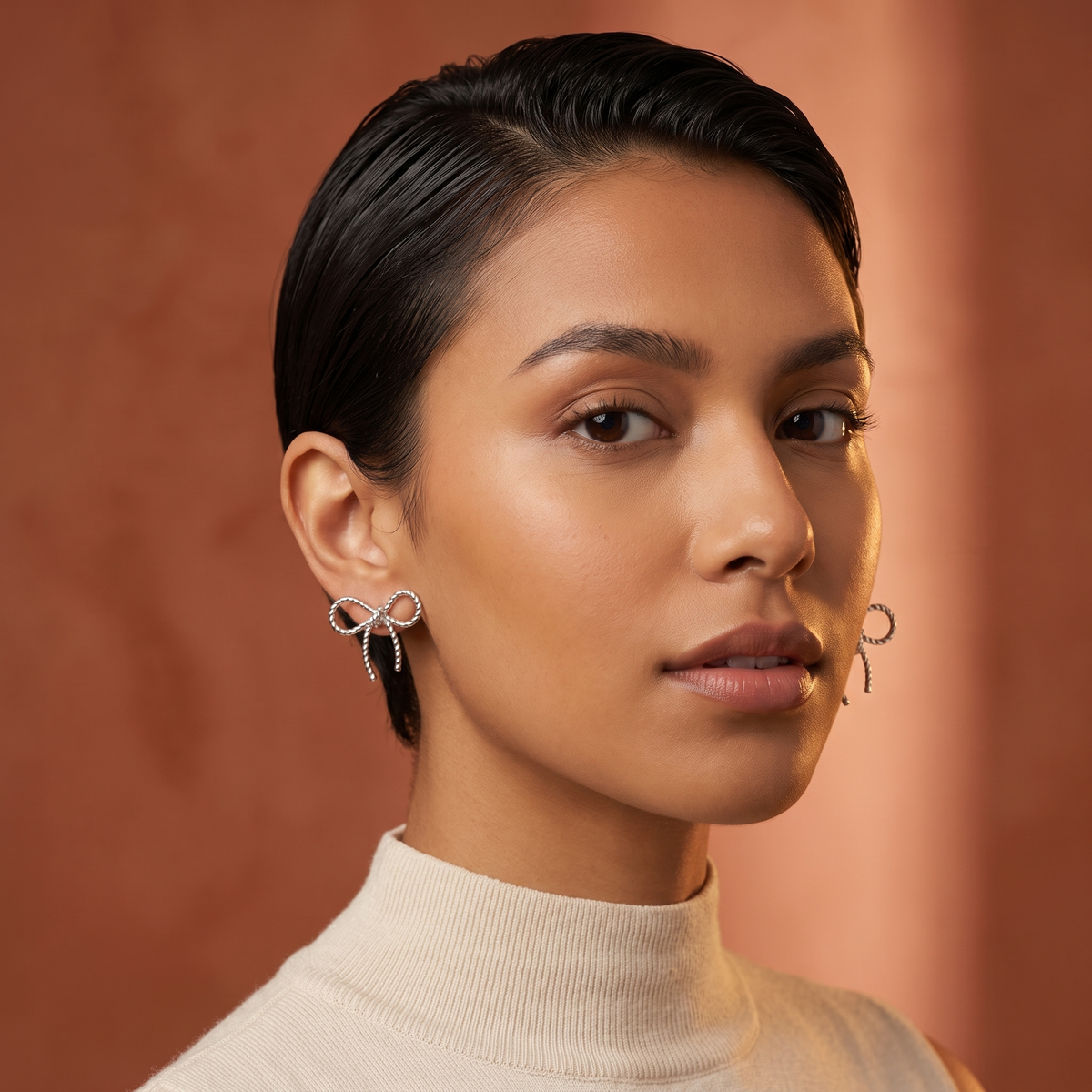 Silver Twisted Bow Stud Earrings