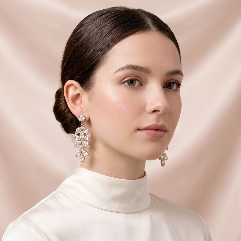 Model wearing Crystal Blossom Chandelier Earrings - gold-tone floral crystal drop earrings