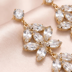 Close-up of Crystal Blossom Chandelier Earrings showing marquise-cut crystals in gold-tone settings