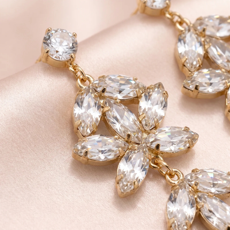 Close-up of Crystal Blossom Chandelier Earrings showing marquise-cut crystals in gold-tone settings