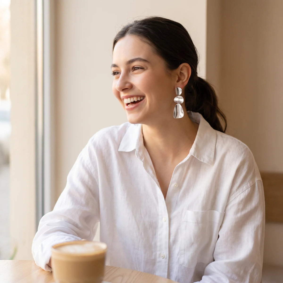 Organic Pebble Tier Drop Earrings styled for an everyday cafe look