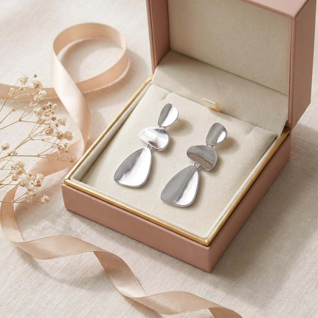 Organic Pebble Tier Drop Earrings in a blush-pink gift box