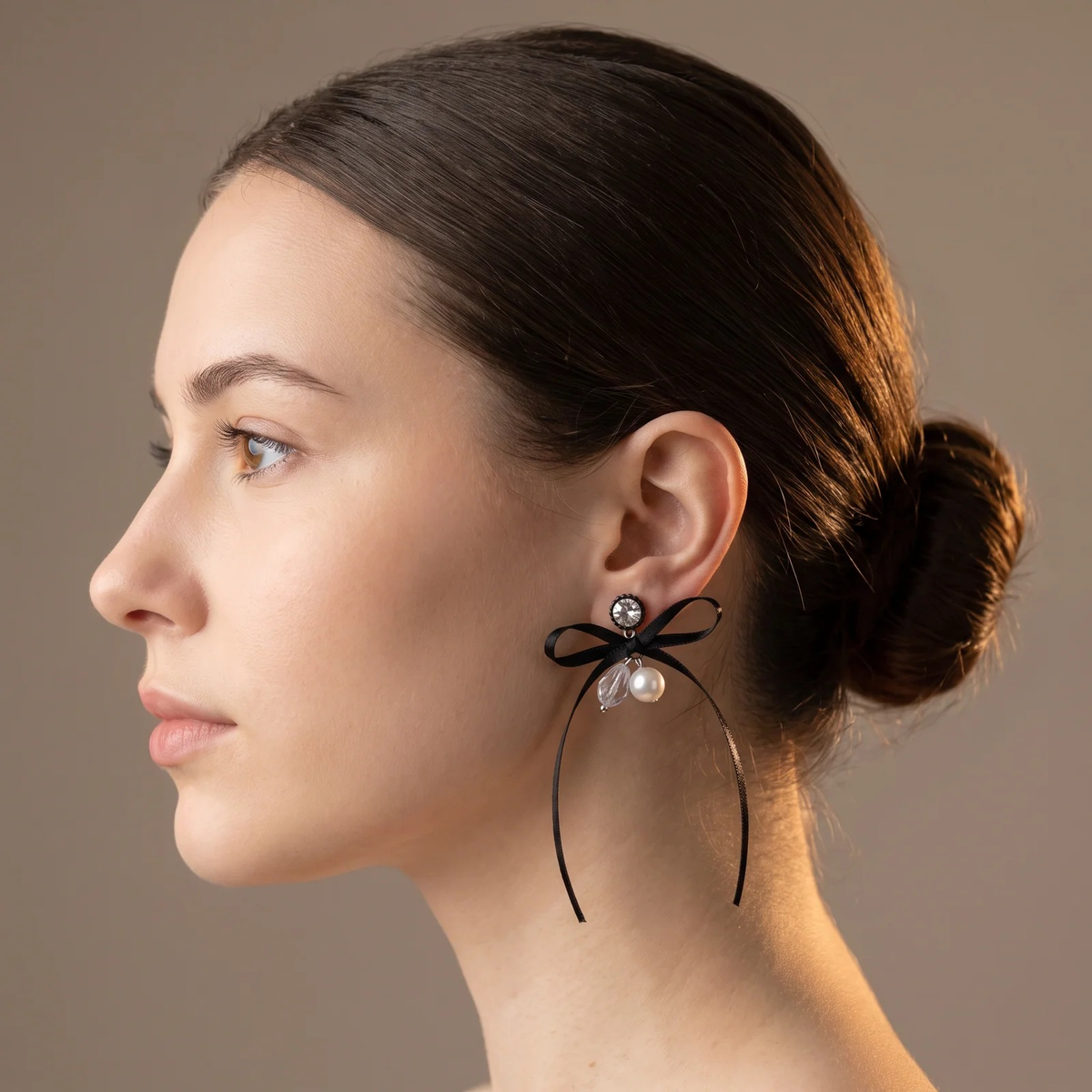 Side profile on ear: Ribbon & Pearl Cluster Earrings