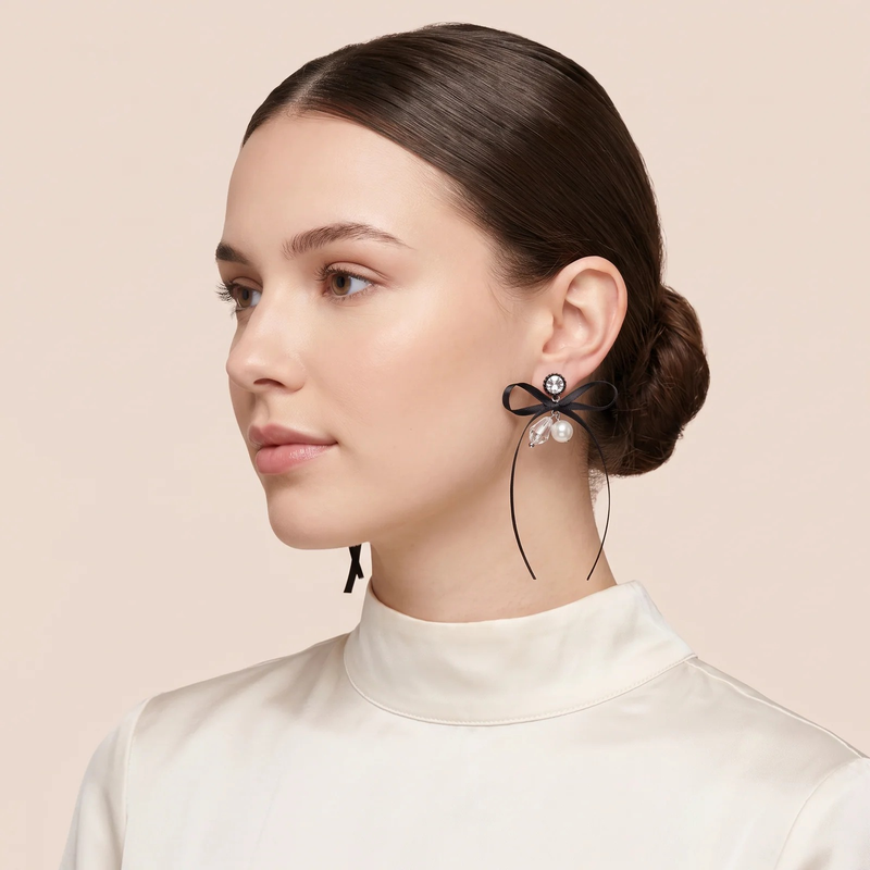 Model wearing Ribbon & Pearl Cluster Earrings