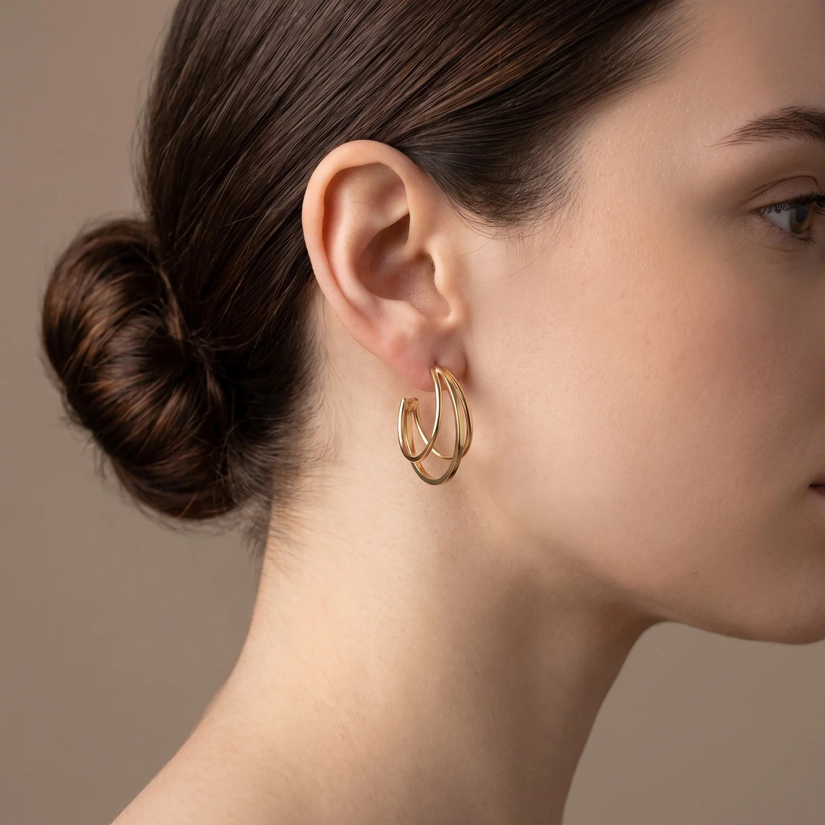 Side profile on ear: Gold Layered Wire Hoop Earrings