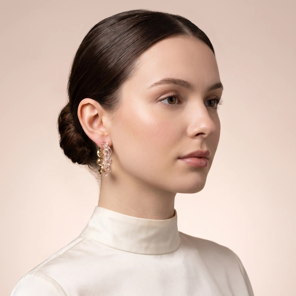 Model wearing Silver and Twisted Resin Hoop Earrings
