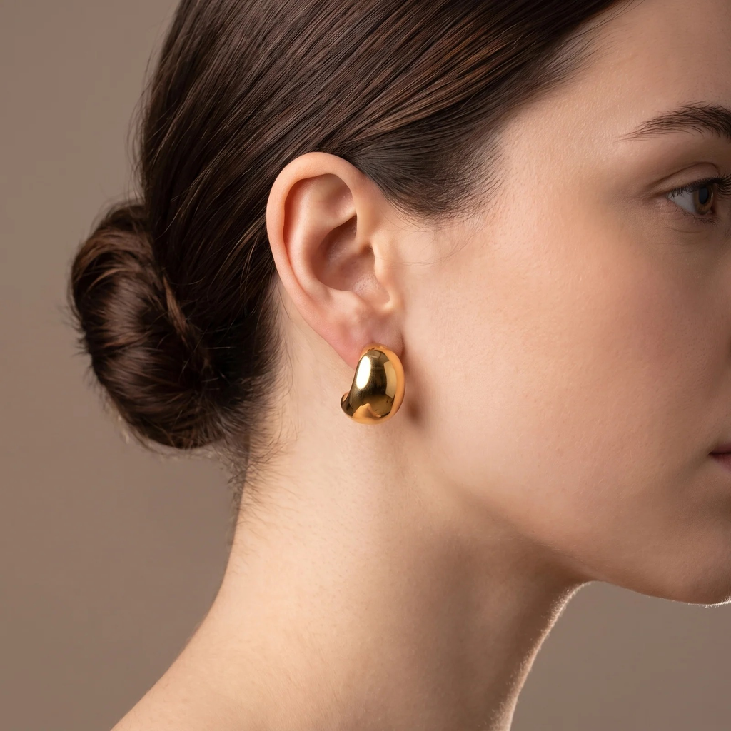 Side profile on ear: Gold Sculptural Puff Stud Earrings