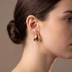 Side profile on ear: Gold Sculptural Puff Stud Earrings