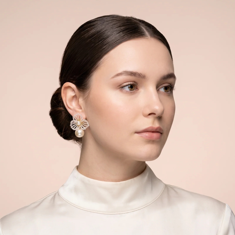 Model wearing Gold-Silver Beaded Flower Pearl Earrings