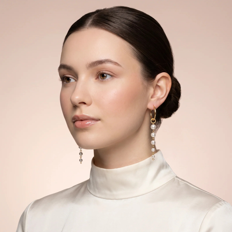 Model wearing Gold Hoop Pearl Drop Earrings