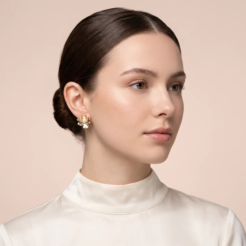 Model wearing Gold Pearl Flower Stud Earrings