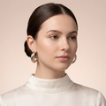 Model wearing Two-Tone Ribbed Hoop Earrings