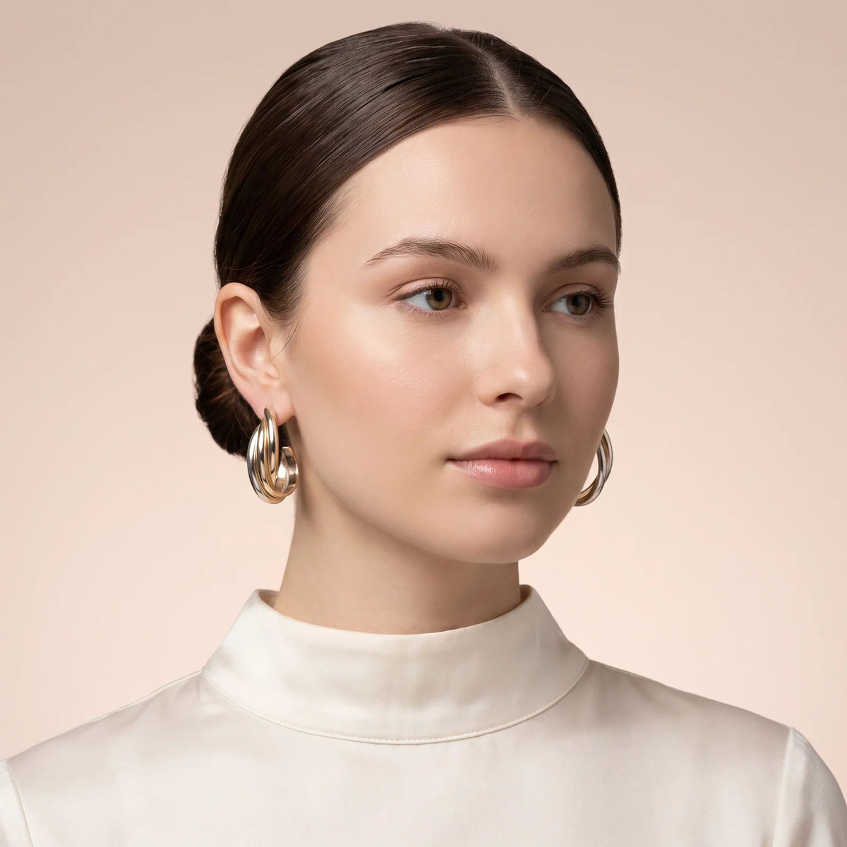 Model wearing Two-Tone Ribbed Hoop Earrings