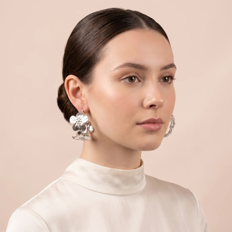 Model wearing Silver Textured Floral Hoop Earring