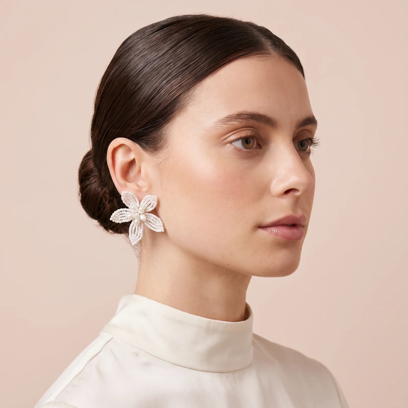 Model wearing Pearl Bloom Floral Earrings