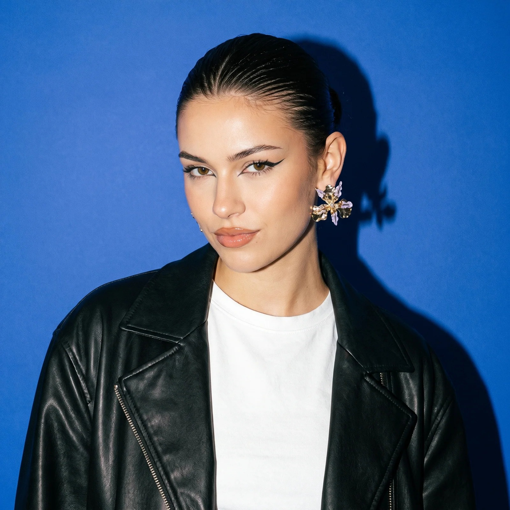 Model wearing Two-Tone Flower Stud Earrings