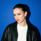 Model wearing Silver Twisted Bow Stud Earrings