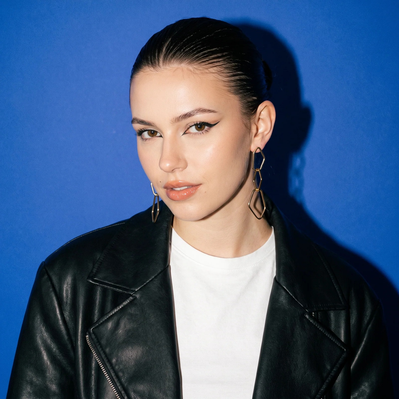 Model wearing Geometric Link Drop Earrings