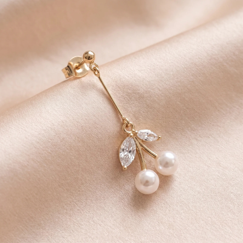 Close-up detail of Pearl Cherry Drop Earrings