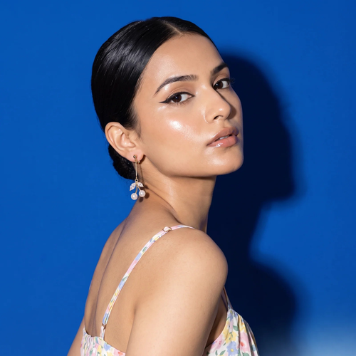 Model wearing Pearl Cherry Drop Earrings