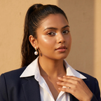 Model wearing Gold Textured Drop Pearl Earrings