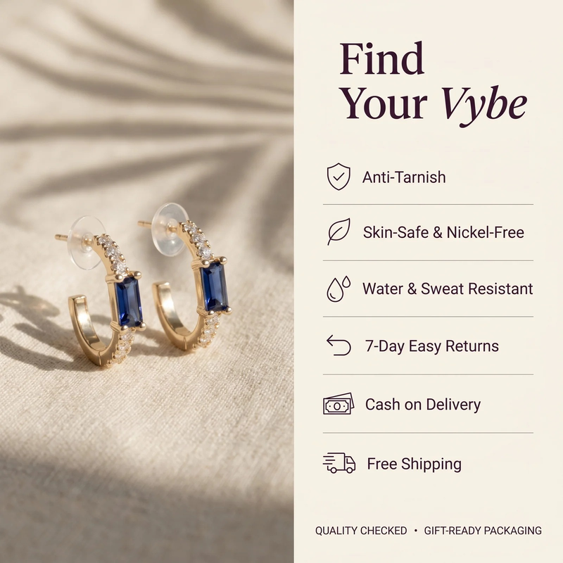 Features and promises: Gold Sapphire Baguette Huggie Earrings