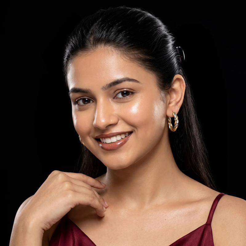 Model wearing Two-Tone Twisted Rope Hoop Earrings