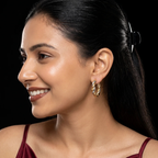 Side profile on ear: Two-Tone Twisted Rope Hoop Earrings