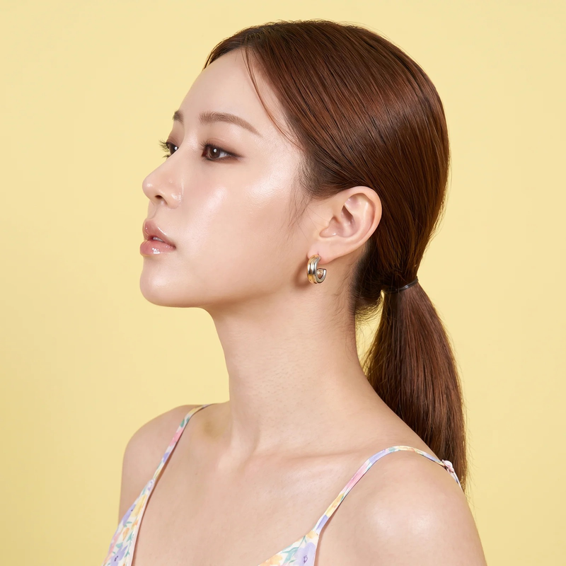 Side profile on ear: Two-Tone Chunky Hoop Earrings