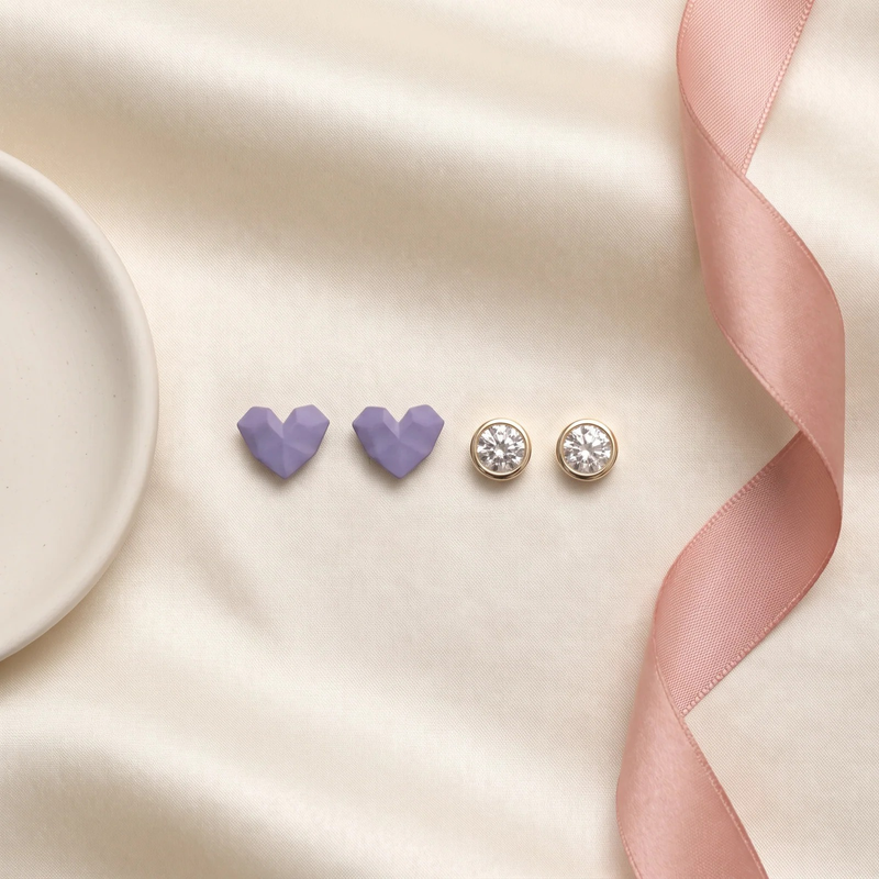 Flat lay of Heart & Crystal Stud Earring Set