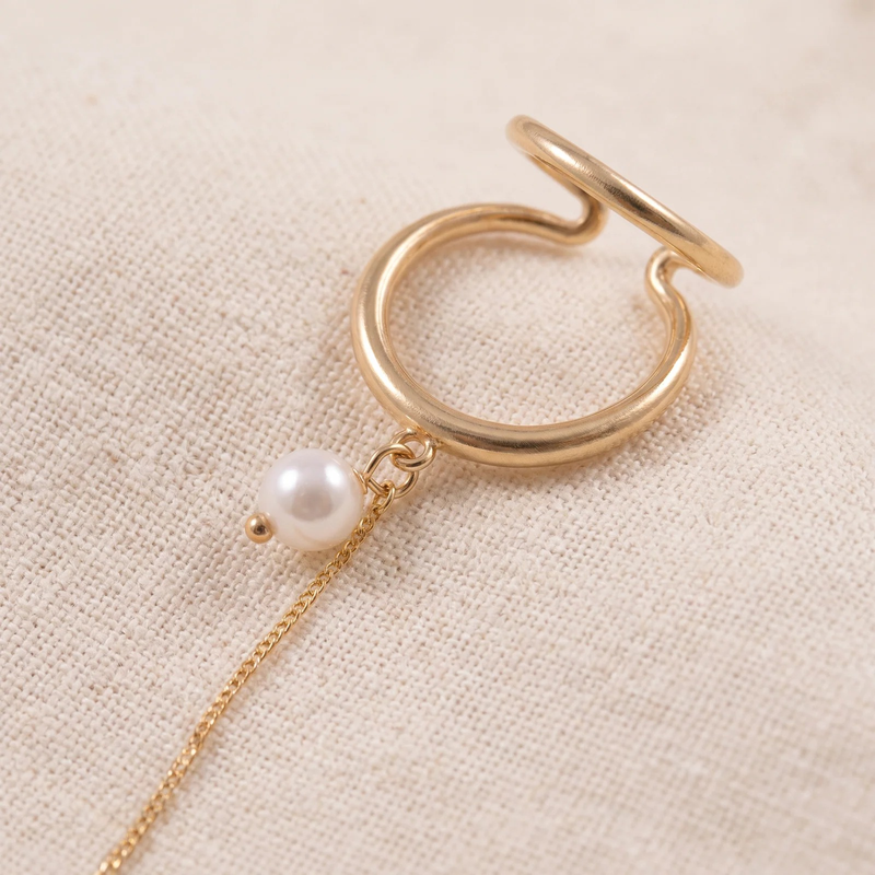 Close-up detail of Gold Pearl Chain Ear Cuff