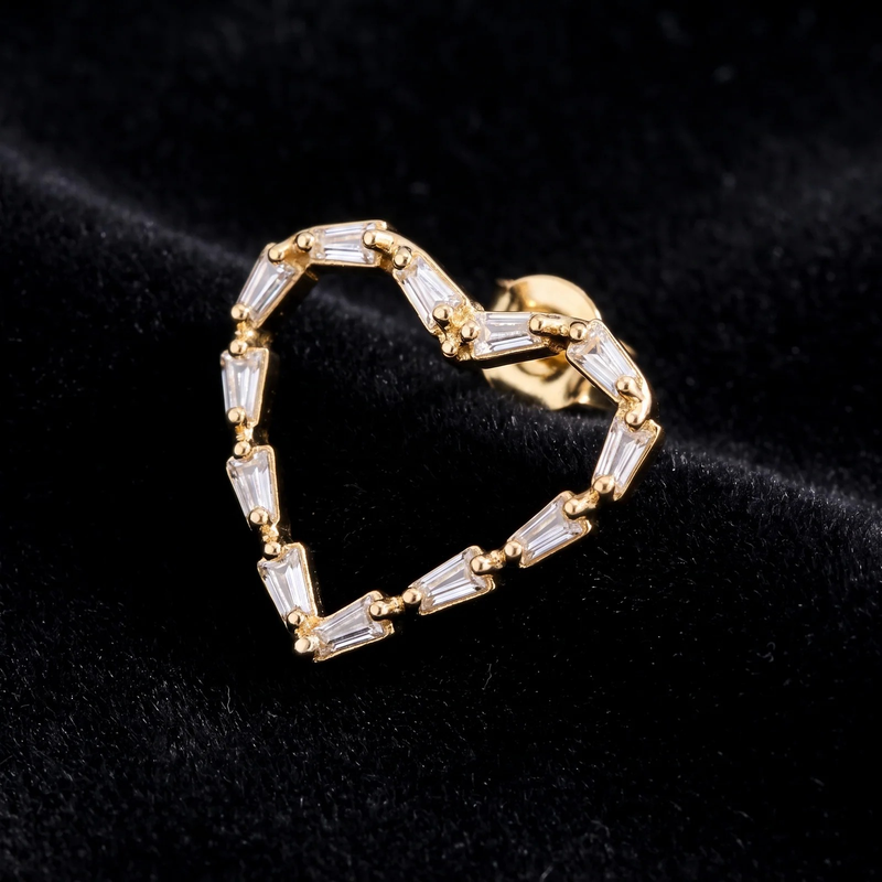 Close-up detail of Gold Baguette Heart Earrings