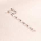 Close-up detail of Cascade Pearl Drop Earrings