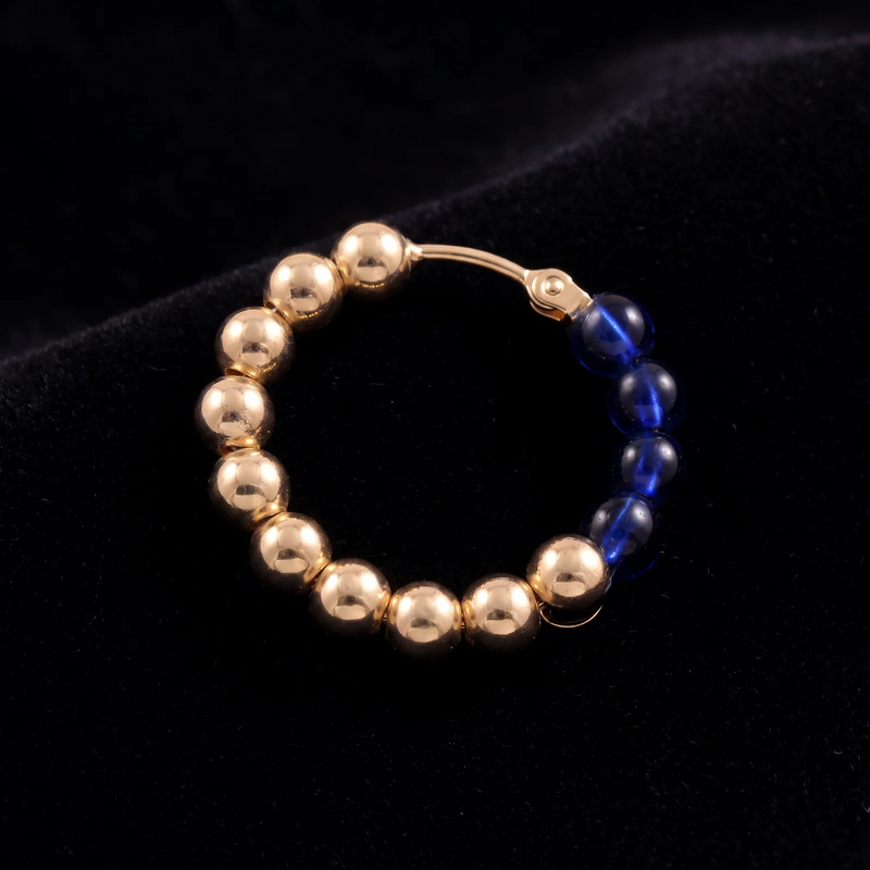 Close-up detail of Sapphire Luxe Hoops