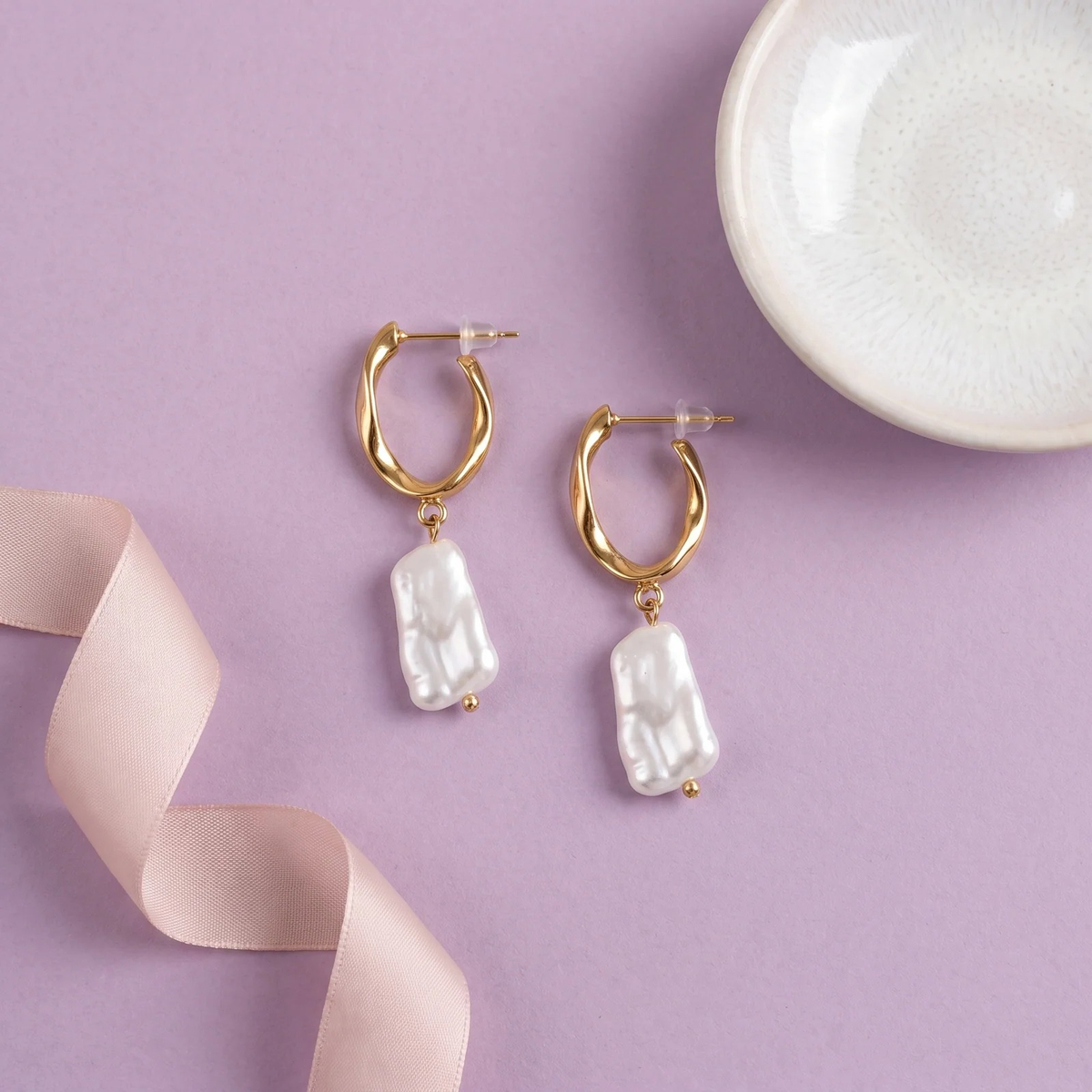 Flat lay of Baroque Pearl Drop Earrings