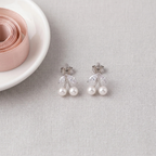 Flat lay of Cherry Pearl Studs