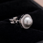 Close-up detail of Grey Pearl Halo Studs