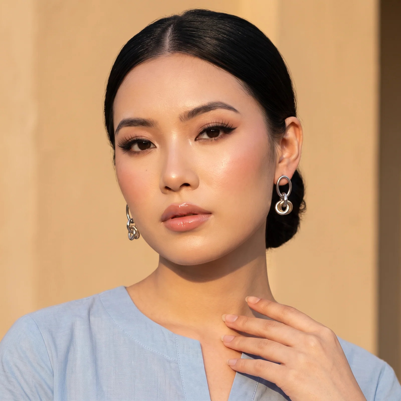 Model wearing Duo Link Drop Earrings