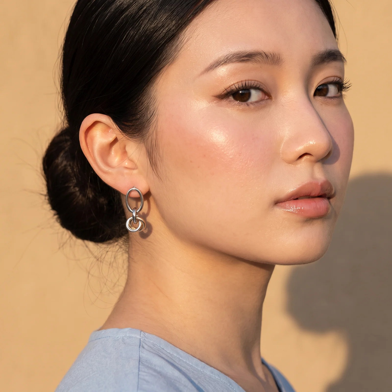 Side profile on ear: Duo Link Drop Earrings