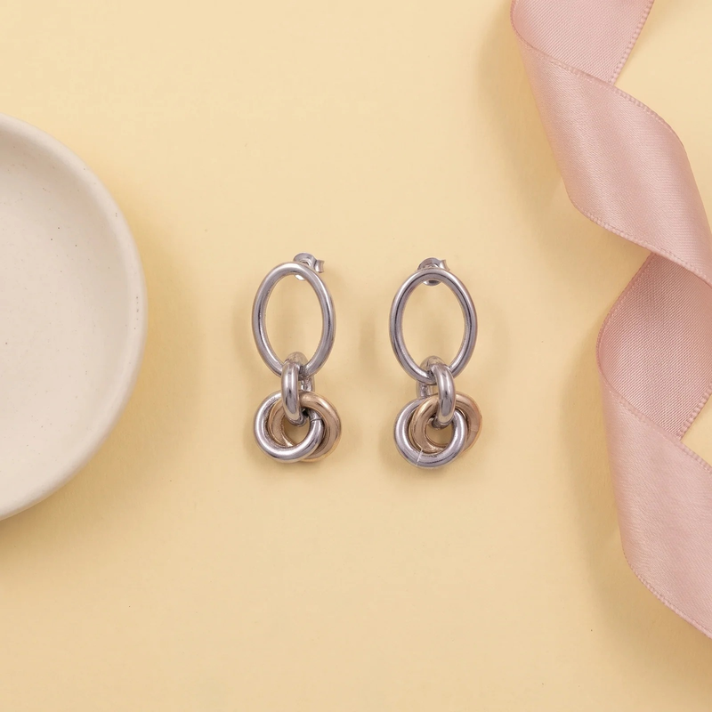 Flat lay of Duo Link Drop Earrings