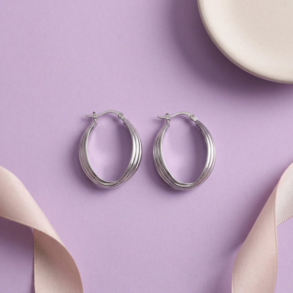 Flat lay of Luna Ribbed Hoop Earrings
