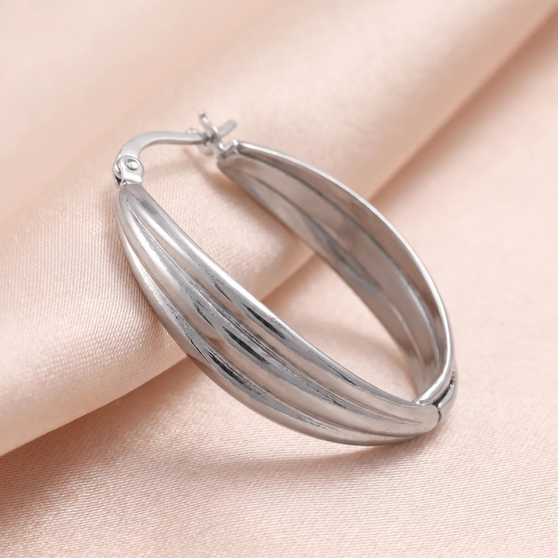 Close-up detail of Luna Ribbed Hoop Earrings