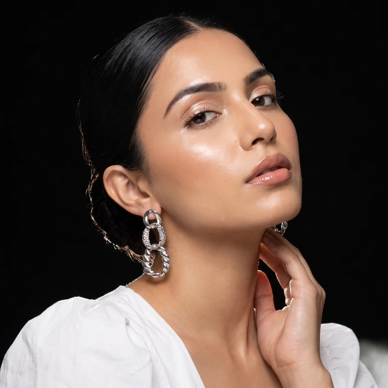Model wearing Mixed Texture Link Drop Earrings