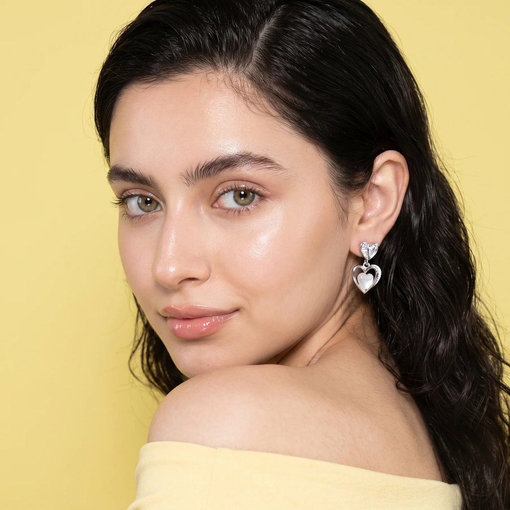 Model wearing Double Heart Crystal Drop Earrings