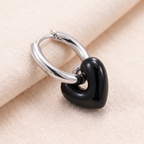 Close-up detail of Heart Charm Hoop Earrings