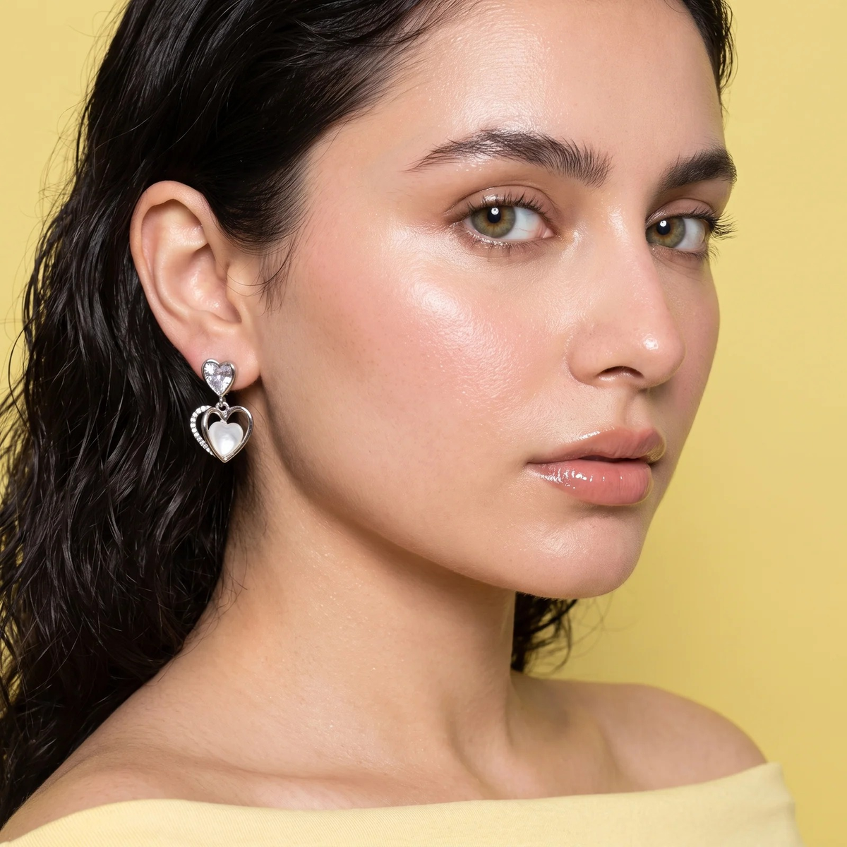 Side profile on ear: Double Heart Crystal Drop Earrings