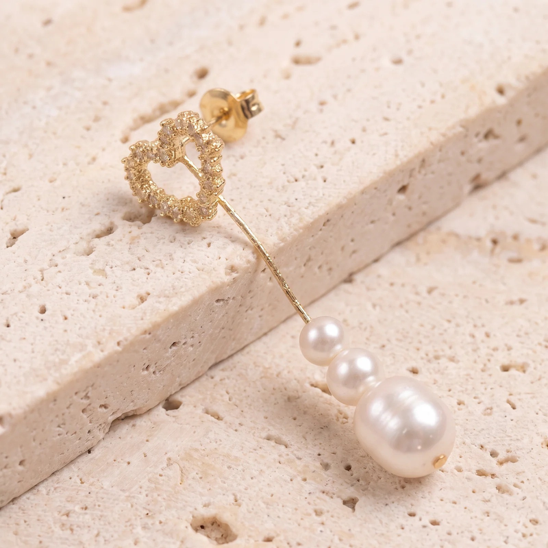 Close-up detail of Crystal Heart Pearl Drop Earring