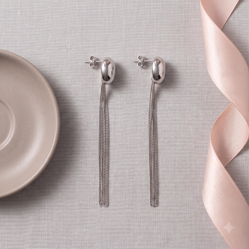 Flat lay of Oval Dome Fringe Drop Earrings